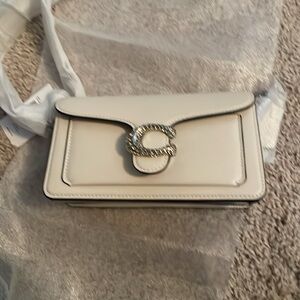 NWT authentic Coach white tabby with crystals
